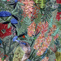 Colorful ceramic mosaic artwork of a bird and floral elements made by Jane du Rand