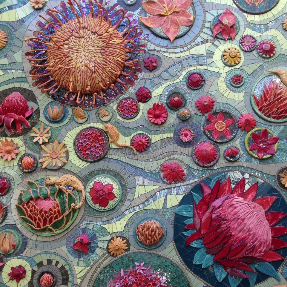 Colorful ceramic mosaic artwork with floral and abstract designs made by Jane du Rand
